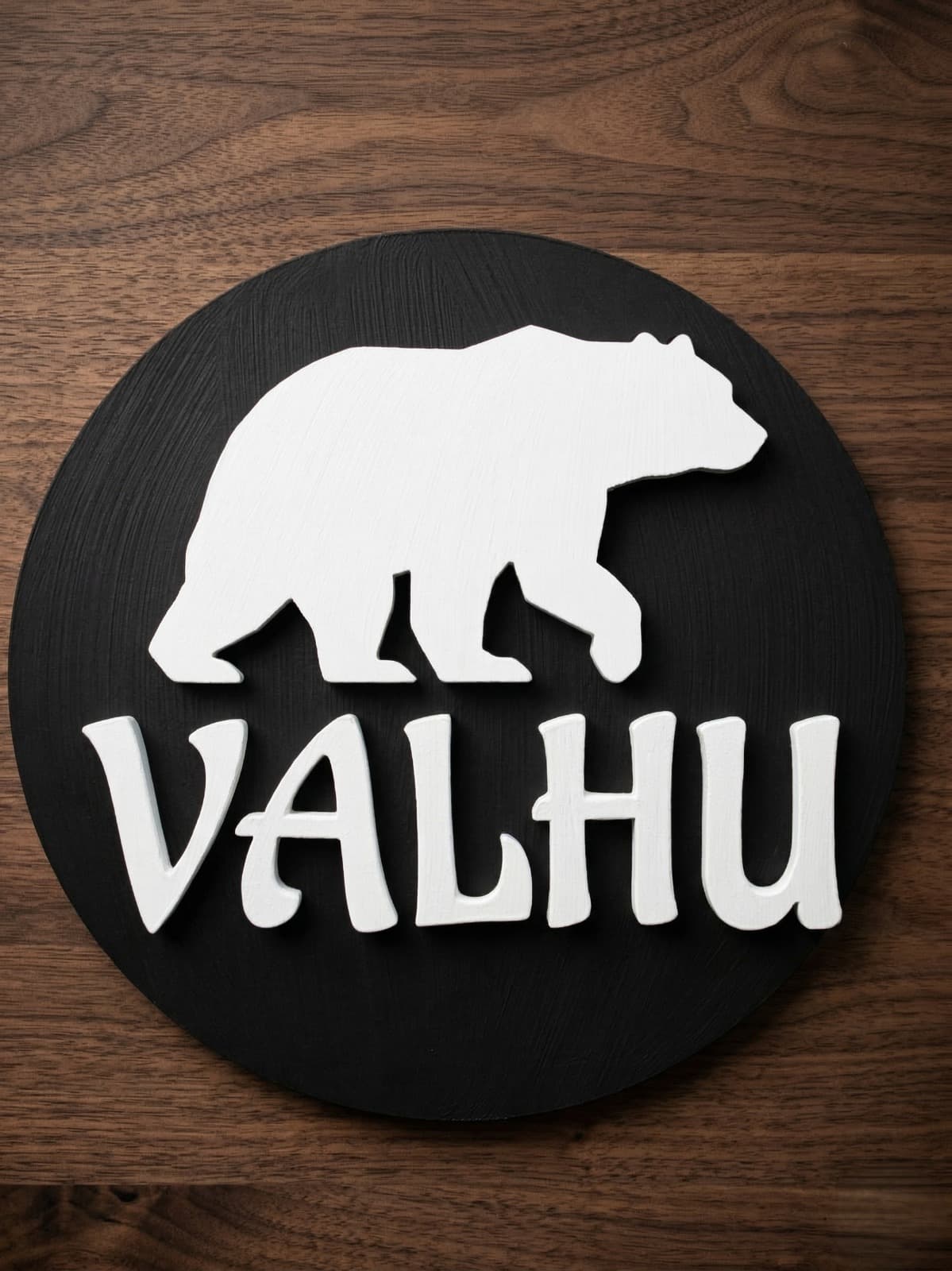 Valhu black bear logo on a dark background